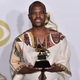 Ladysmith Black Mambazo, winner of the best world music album poses in the press room at the 60th annual Grammy Awards Jan. 28, 2018, in New York.